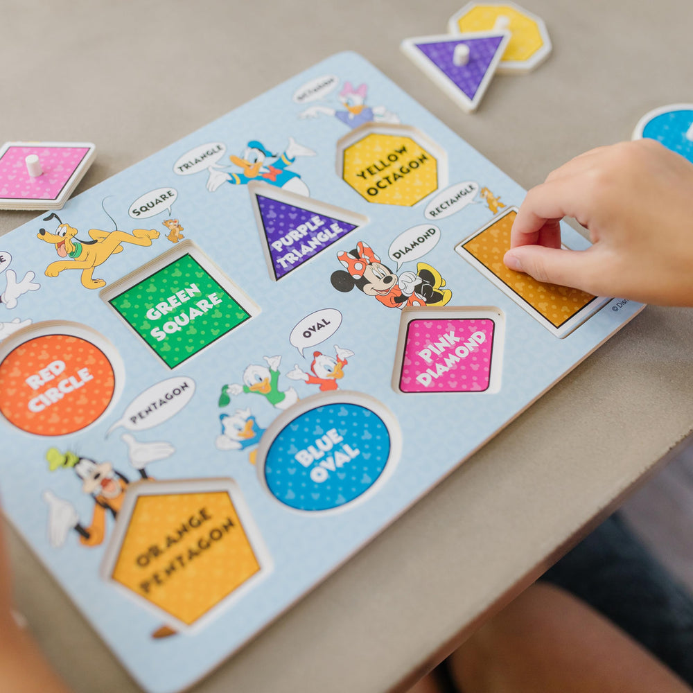 Melissa & Doug Disney peg puzzles artwork closeup: vibrant Disney artwork sparks playful exploration.
