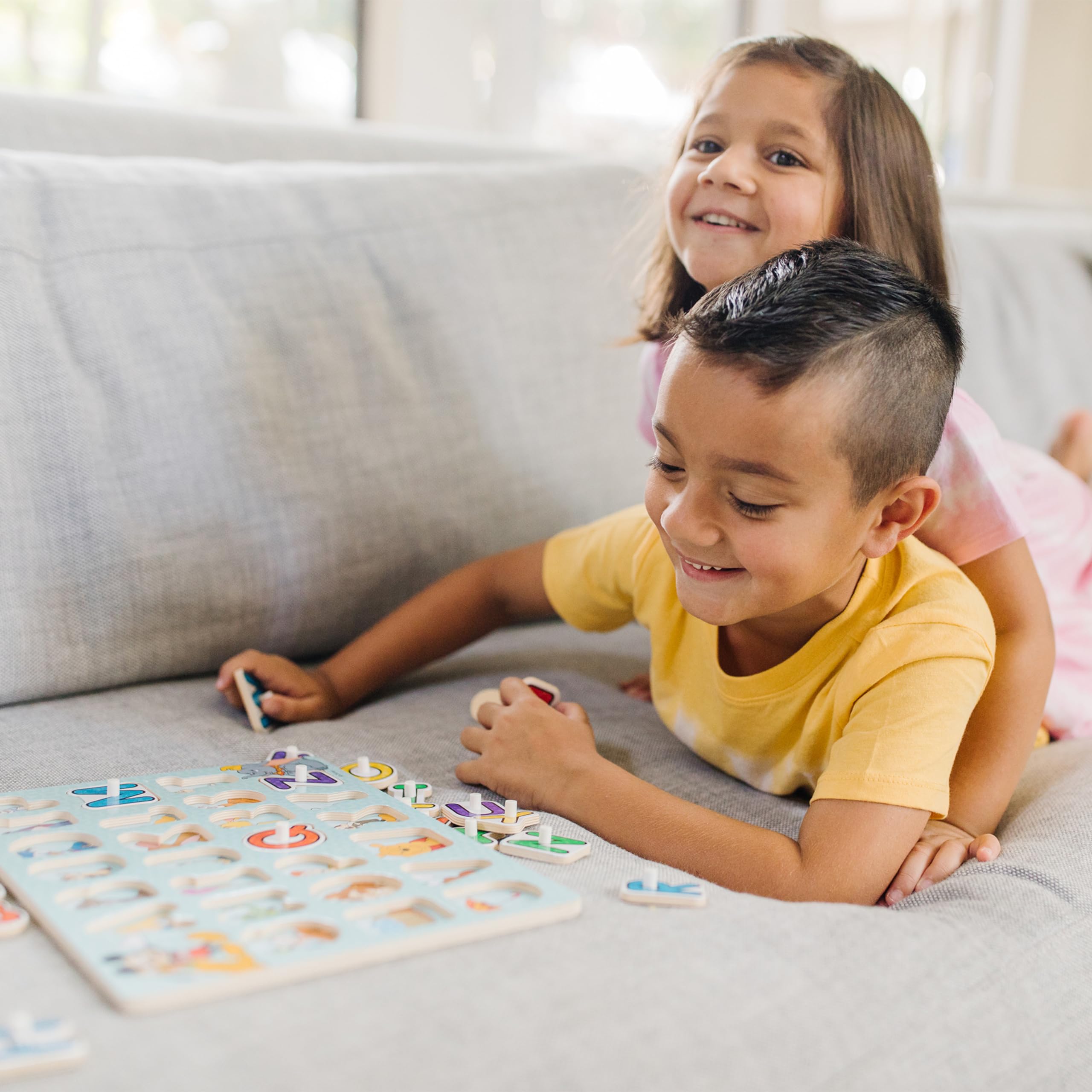 Melissa & Doug Disney peg puzzles letters pegs: sturdy grip helps little hands pick pieces.
