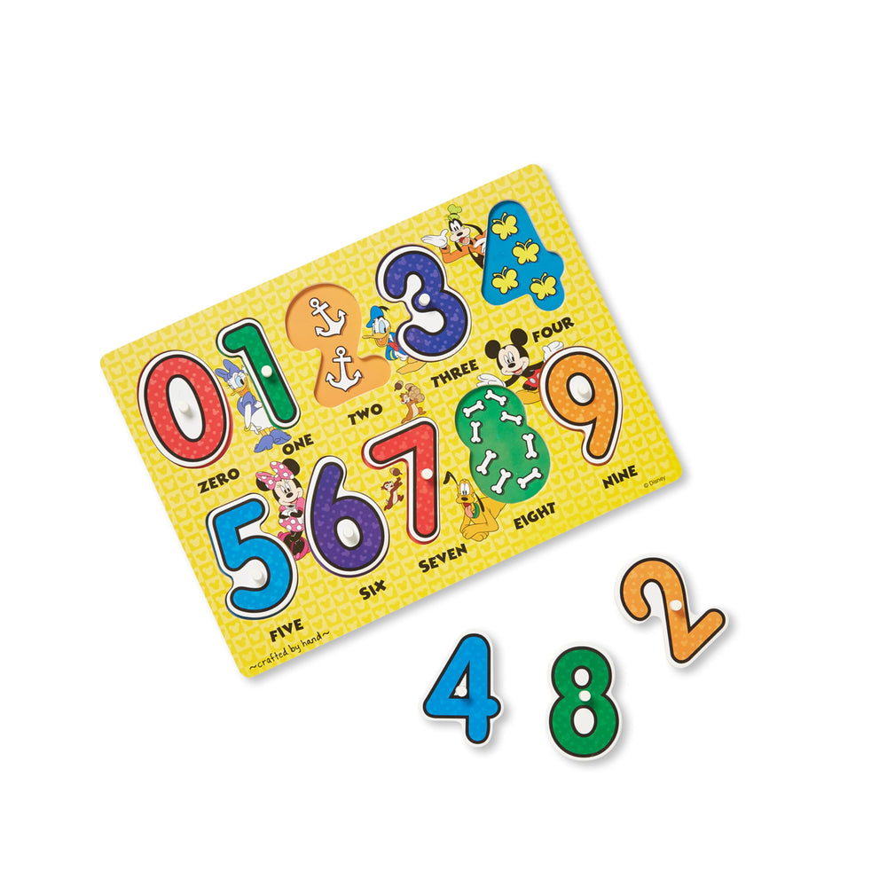 Melissa & Doug Disney peg puzzles numbers pegs: easy grip for counting with 0–9.