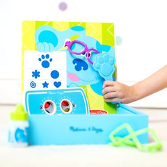 Melissa & Doug display board creates a ready-to-play exam room setup.