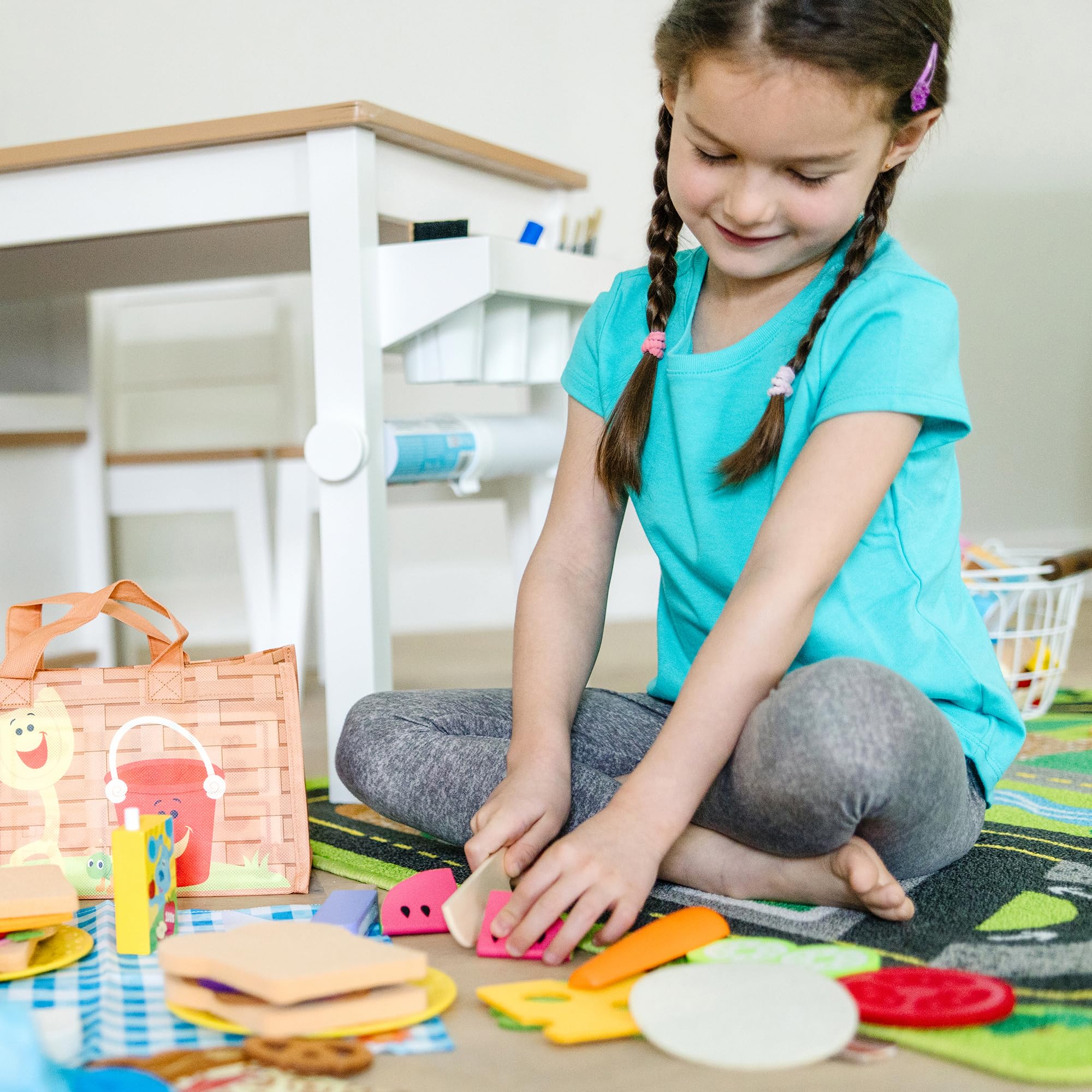 Melissa & Doug double-sided activity card guiding counting and matching