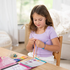 Melissa & Doug On the Go loom and supplies support easy bracelet patterns.