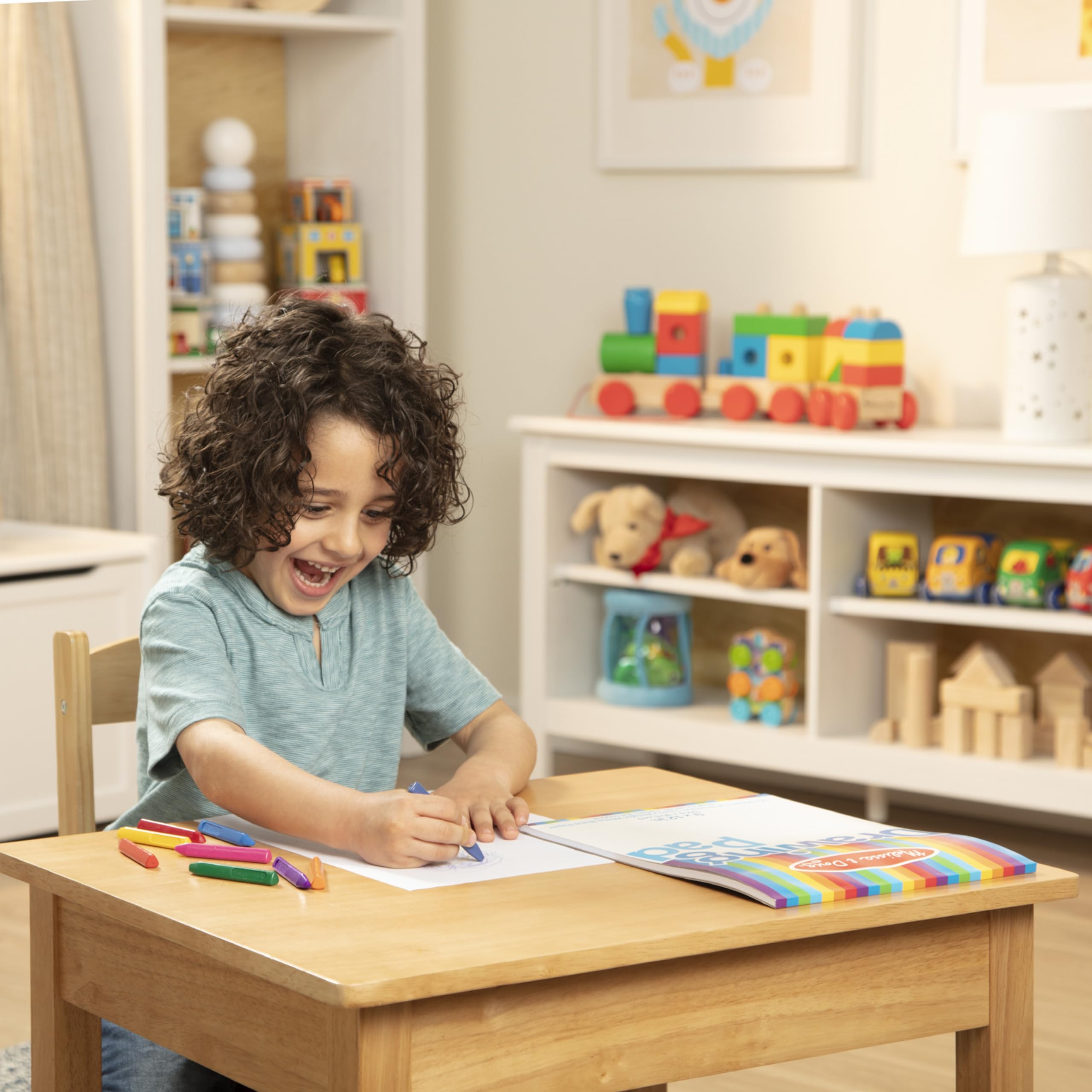 Melissa & Doug Drawing Pad uses durable binding to keep pages intact during use