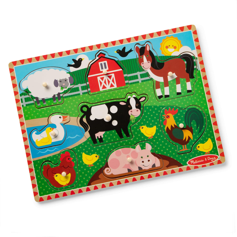Melissa & Doug farmyard scene on a wooden board with wells for pieces.