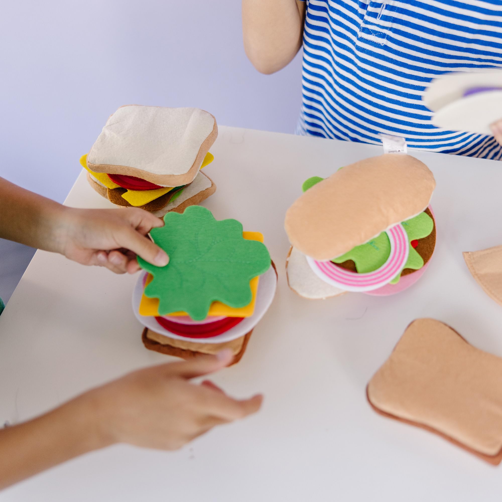 Melissa & Doug felt grinder or hoagie for versatile builds.