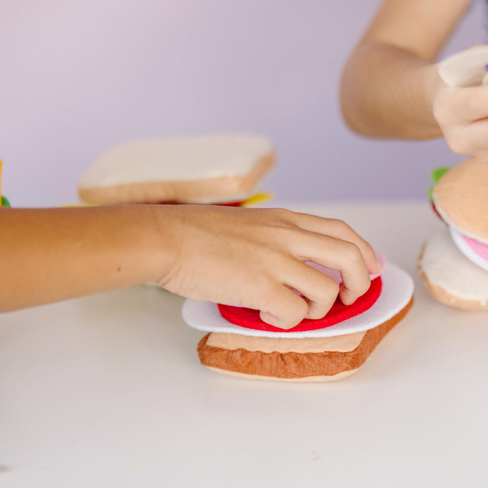 Melissa & Doug felt pita pocket for easy sandwich exploration.
