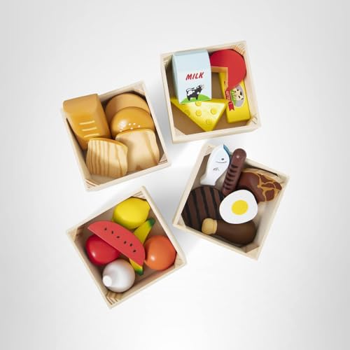 Pretend meal assembly with Melissa & Doug Food Groups for imaginative nutrition play.