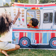 Melissa & Doug mesh front window lets kids peek outside during street-side service imagination.