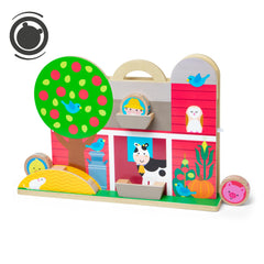 Melissa & Doug GO Tots barnyard tumble disks rolling through a silo for tactile play