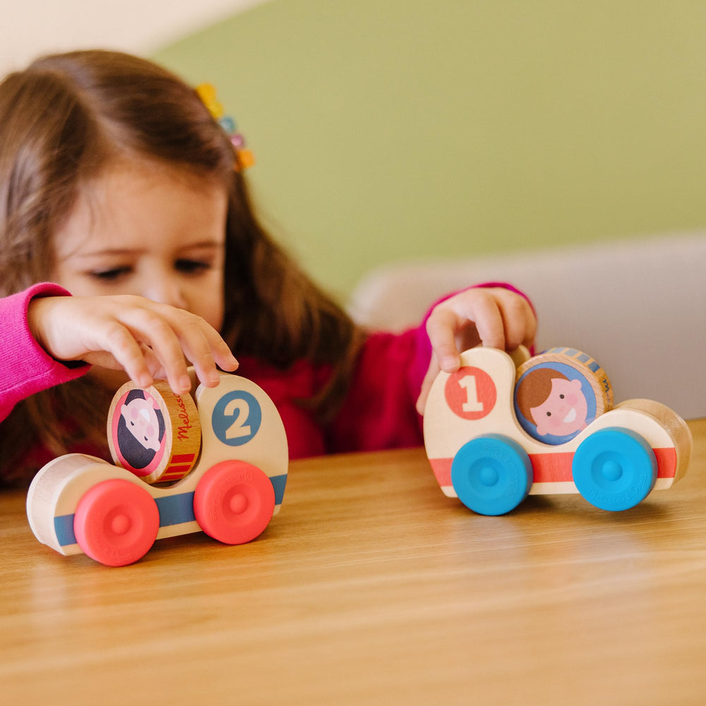 Melissa & Doug GO Tots disks showing characters for stacking and color-recognition practice.