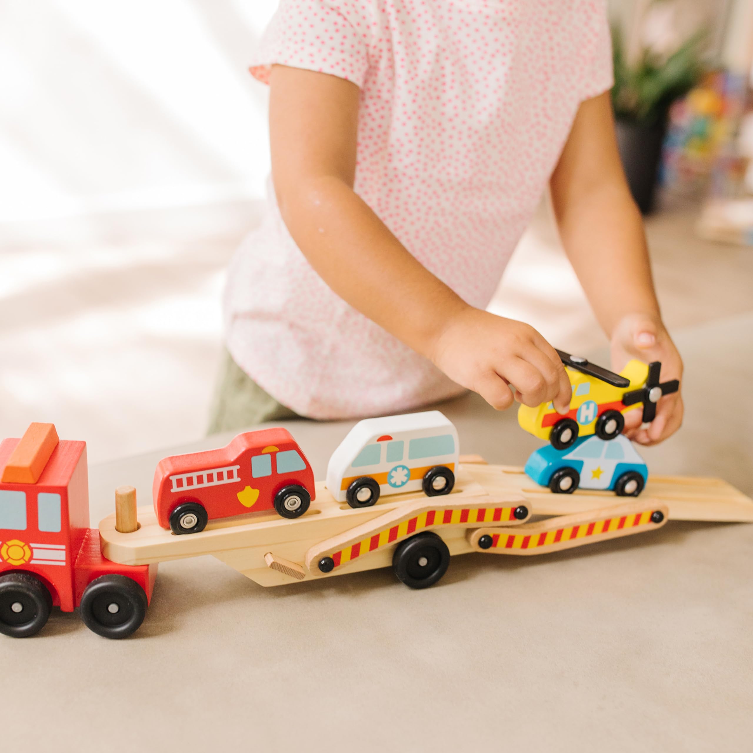 Melissa & Doug helicopter with rotating blade adds dynamic air rescue moments.