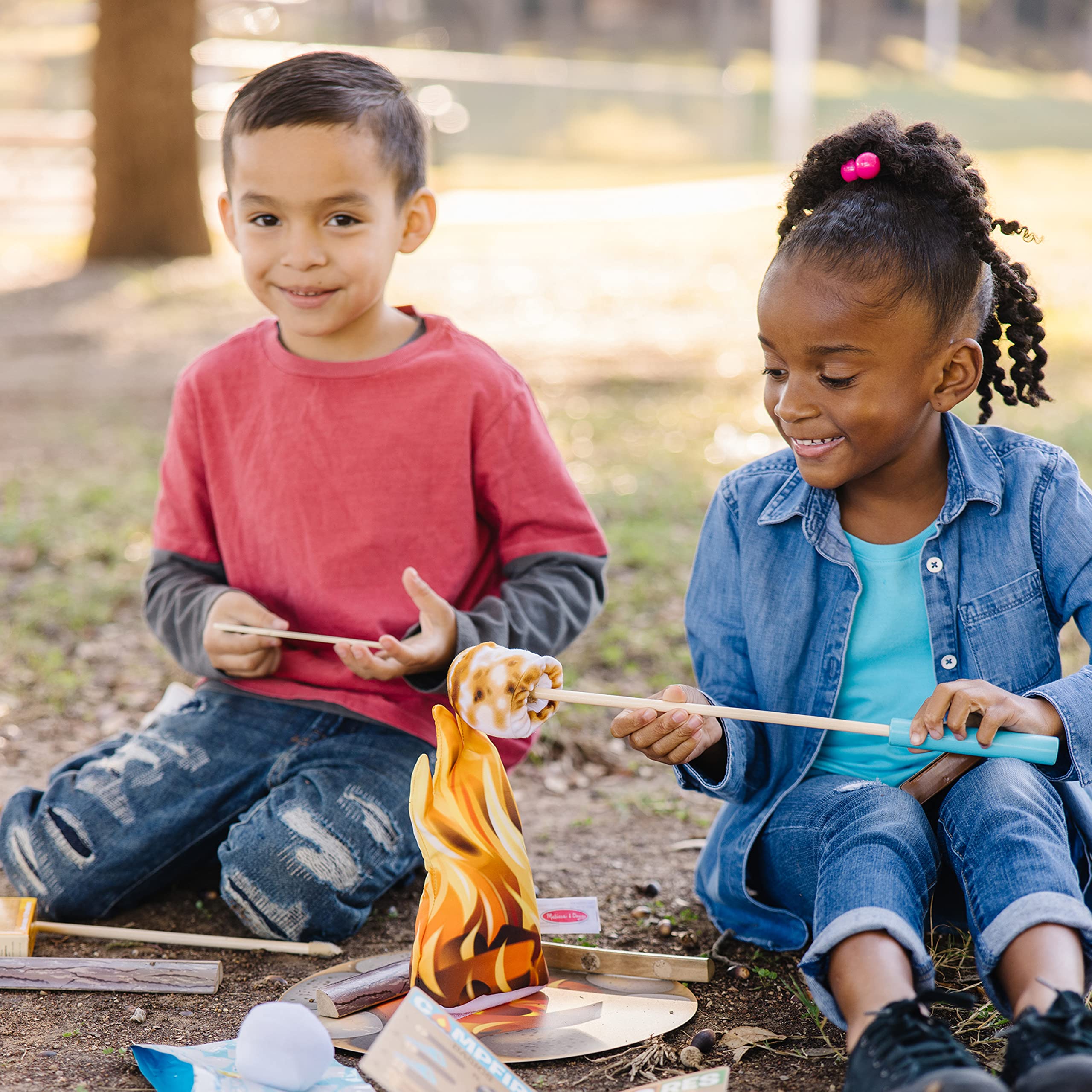 Melissa & Doug Lets Explore Campfire Saw to build fine motor skills during play.
