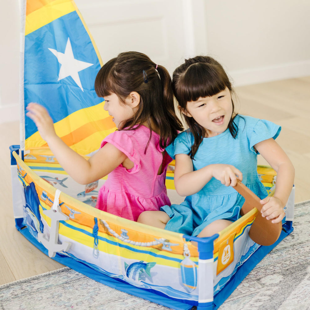 Melissa & Doug Lets Explore Sailboat foam rudder for hands-on role play.