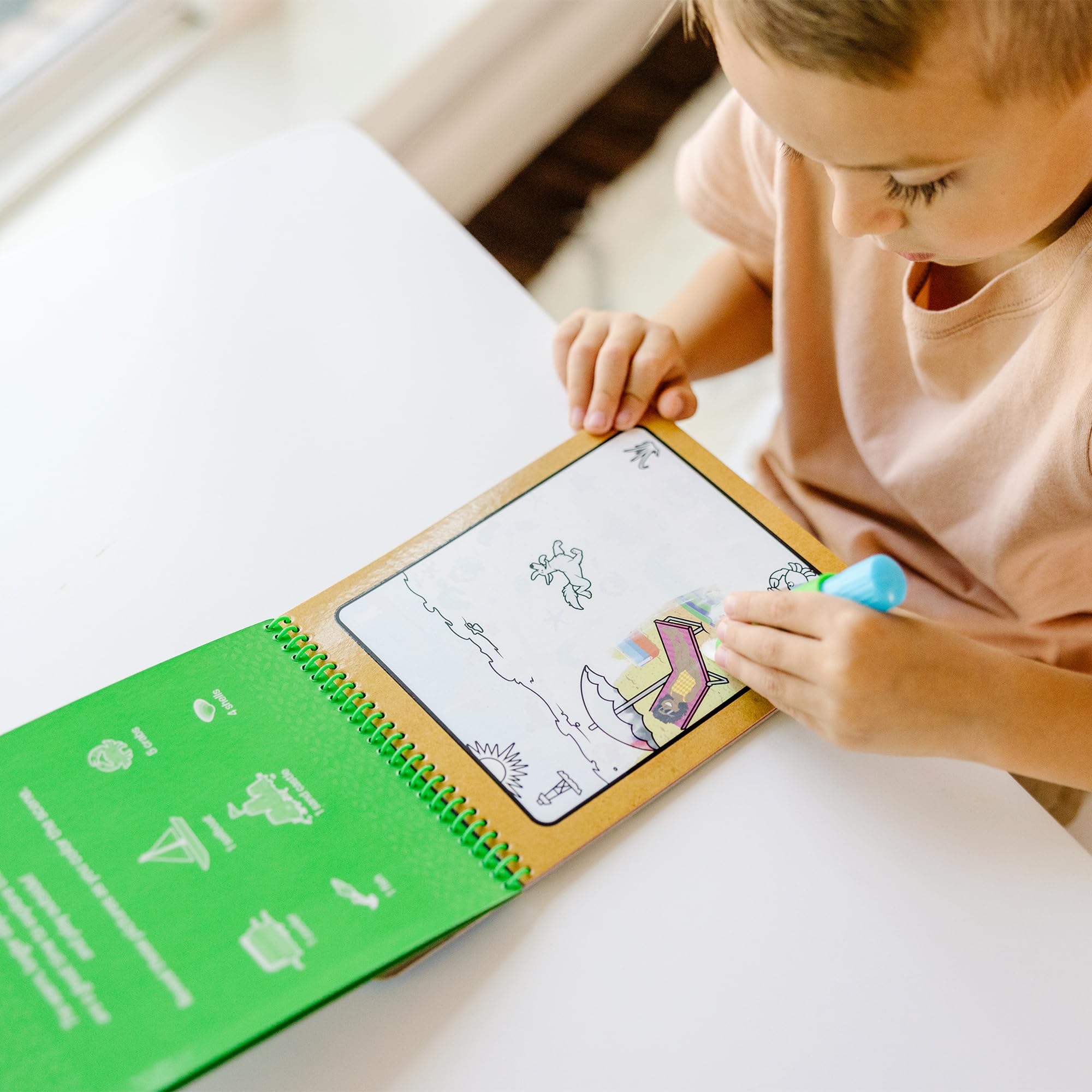 Melissa & Doug Water Wow Seasons pages dry to white for reuse.
