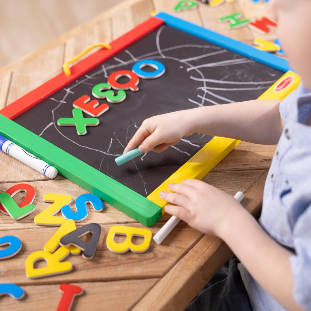 Melissa & Doug dry-erase board side invites drawing and easy erasing for practice.