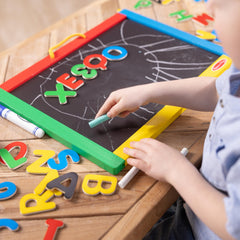 Melissa & Doug dry-erase board side invites drawing and easy erasing for practice.
