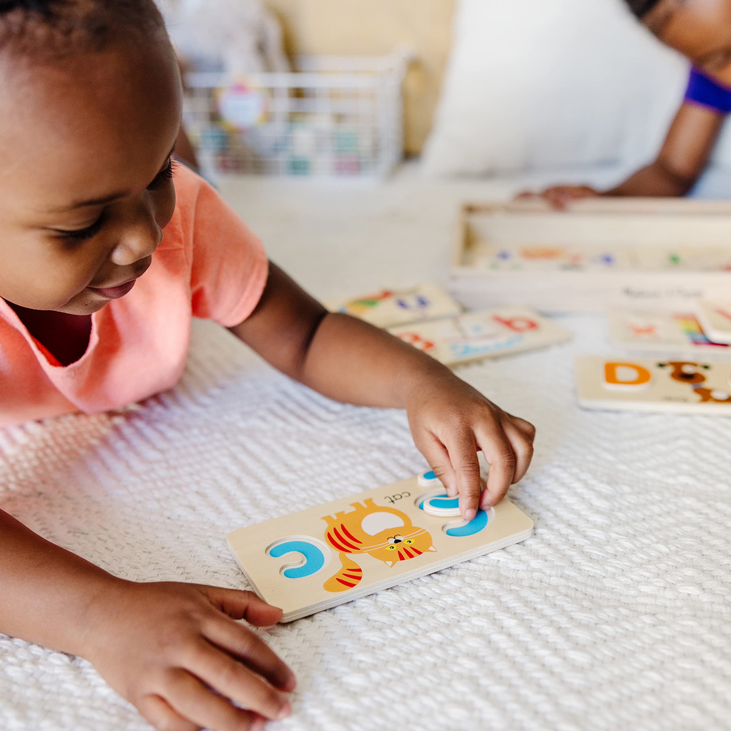 Melissa and Doug letters close-up showing uppercase and lowercase symbols