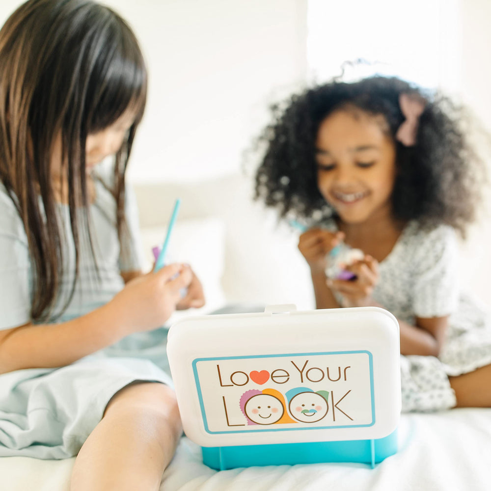 Melissa & Doug Love Your Look 12-color eye shadow palette for creative pretend makeup.
