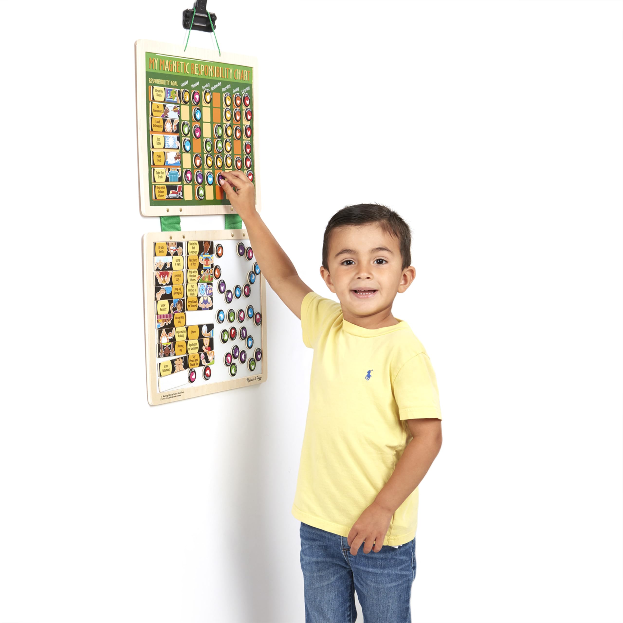 Melissa & Doug magnet storage board keeps pieces accessible.