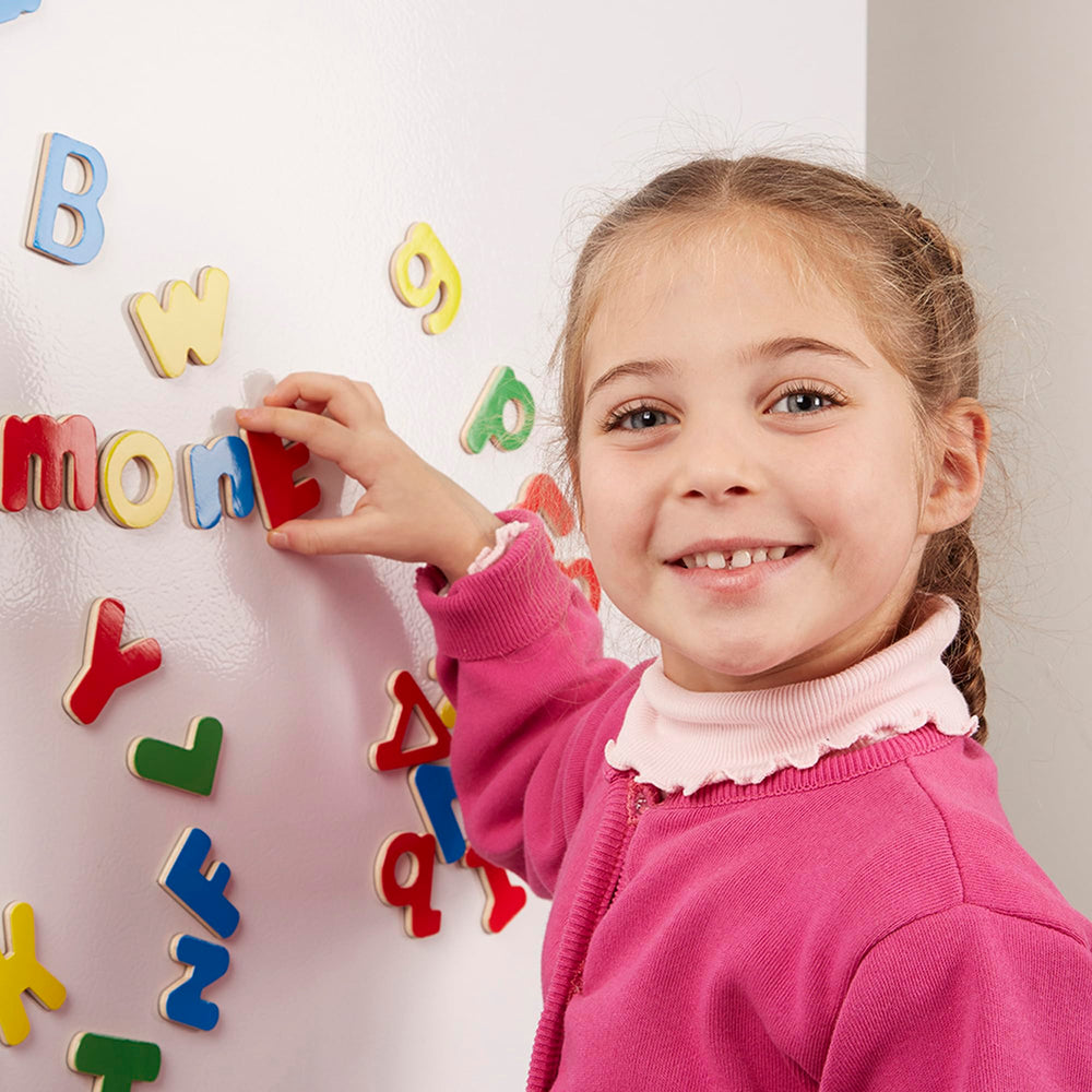 Montessori inspired alphabet magnets supporting fine motor skills and early literacy.