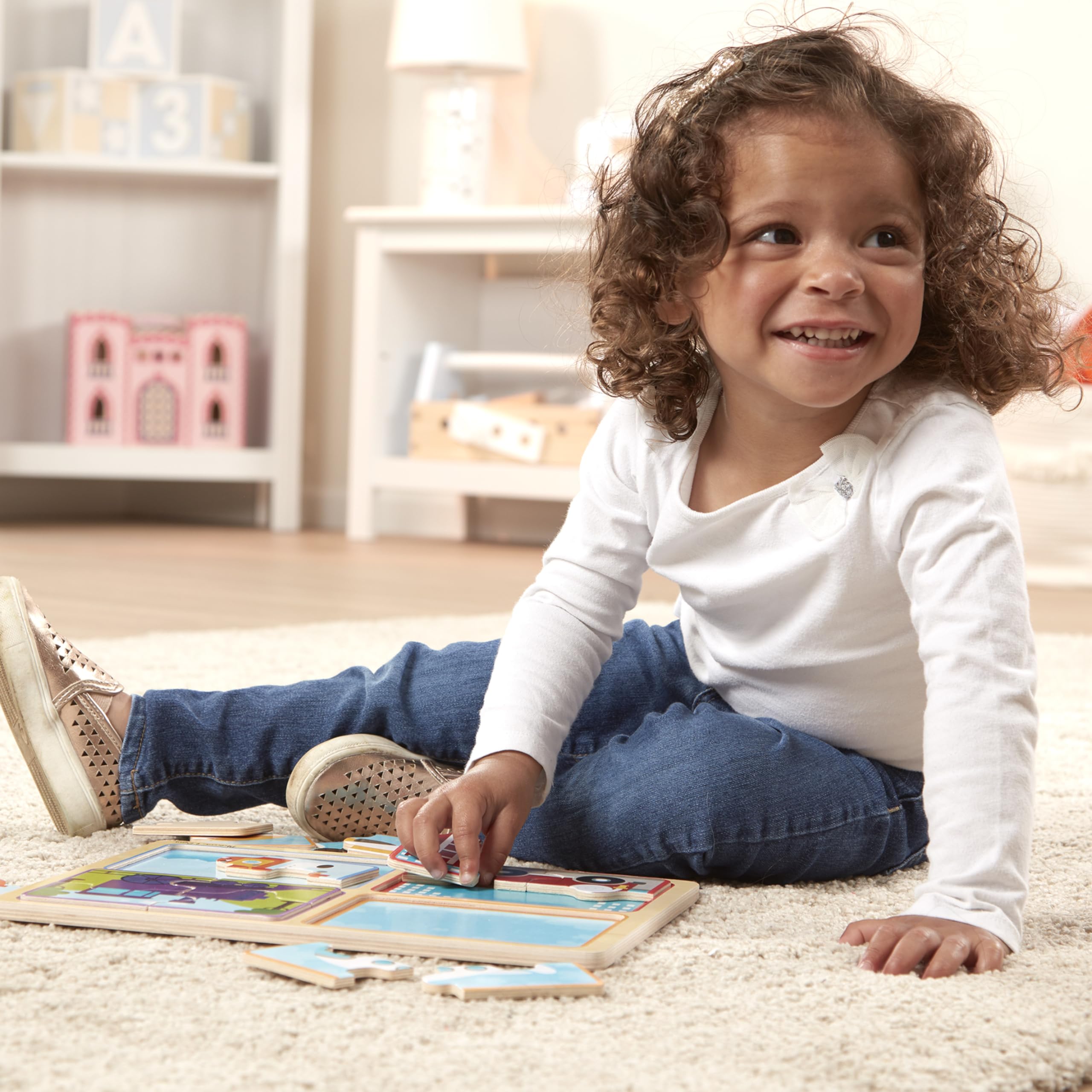 Melissa & Doug Ready Set Go puzzle board wells keep pieces organized.