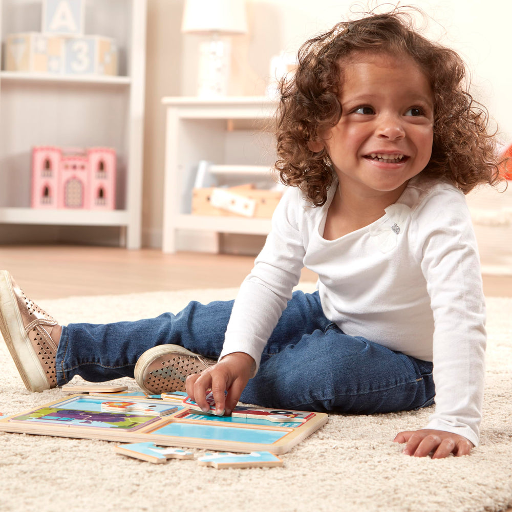 Melissa & Doug Ready Set Go puzzle board wells keep pieces organized.