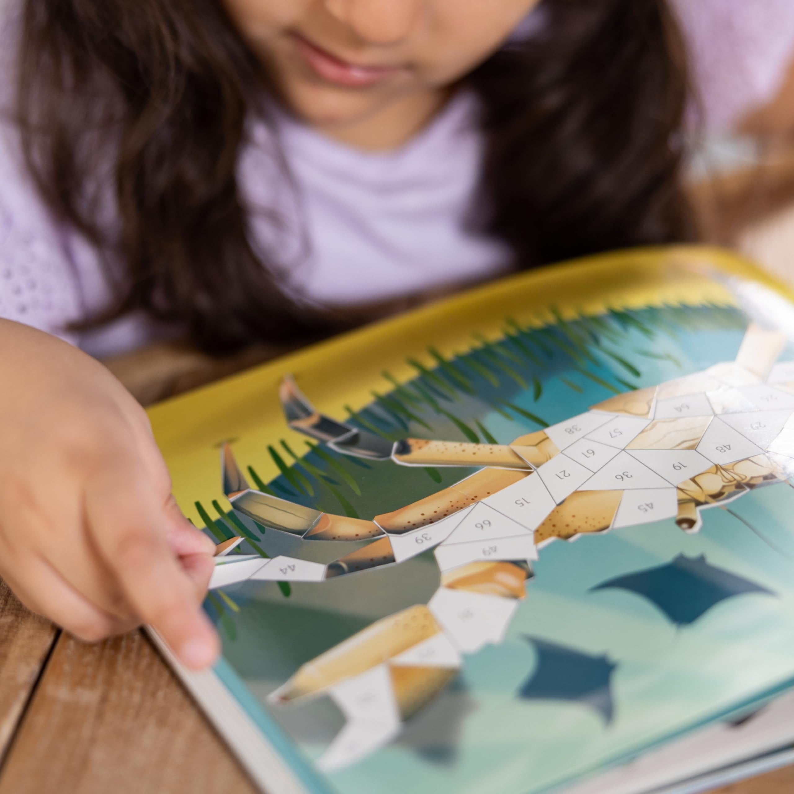 Melissa and Doug Ocean Animals mosaic scene 8 includes sea stars and crabs for fine motor practice.