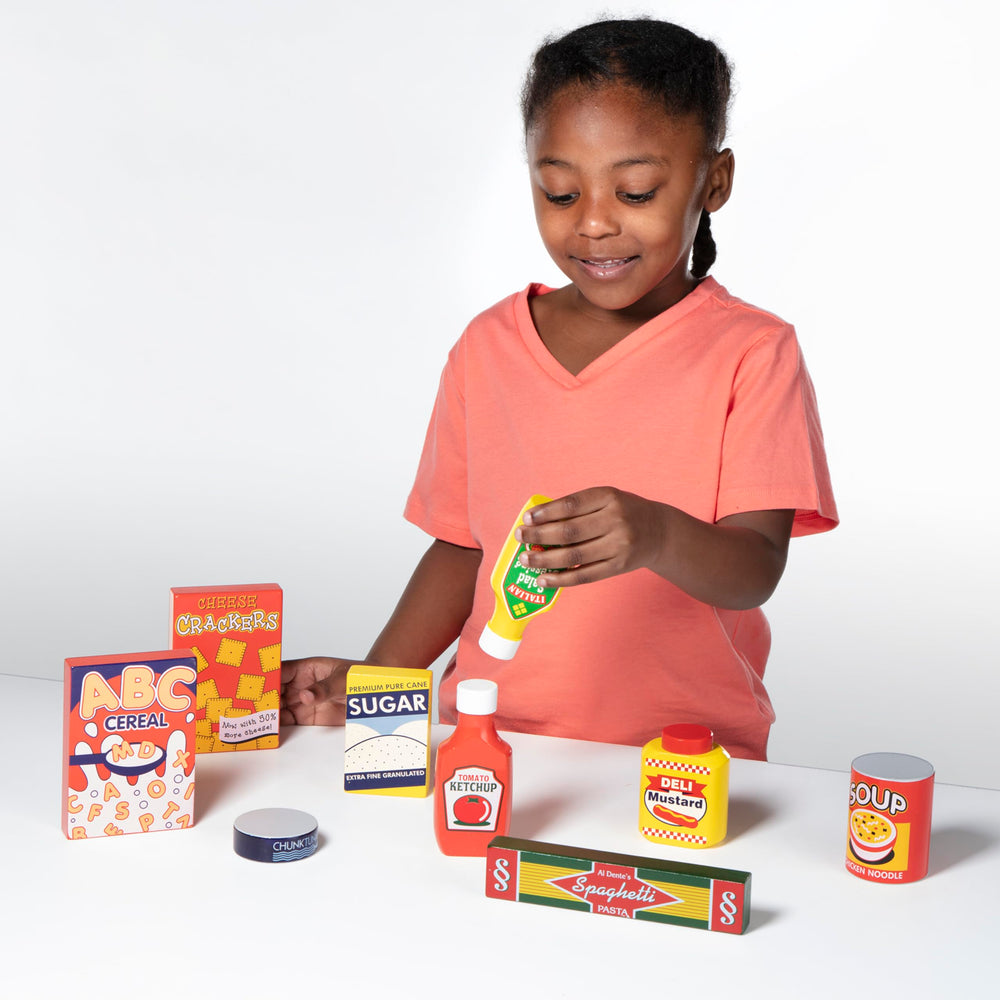 Melissa & Doug wooden mustard play food adds seasoning to stories.