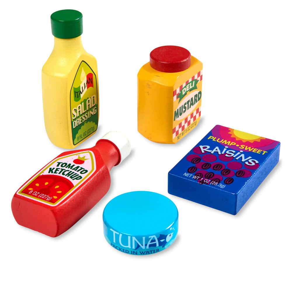 Melissa & Doug wooden salad dressing play food for flavorful pretend meals.