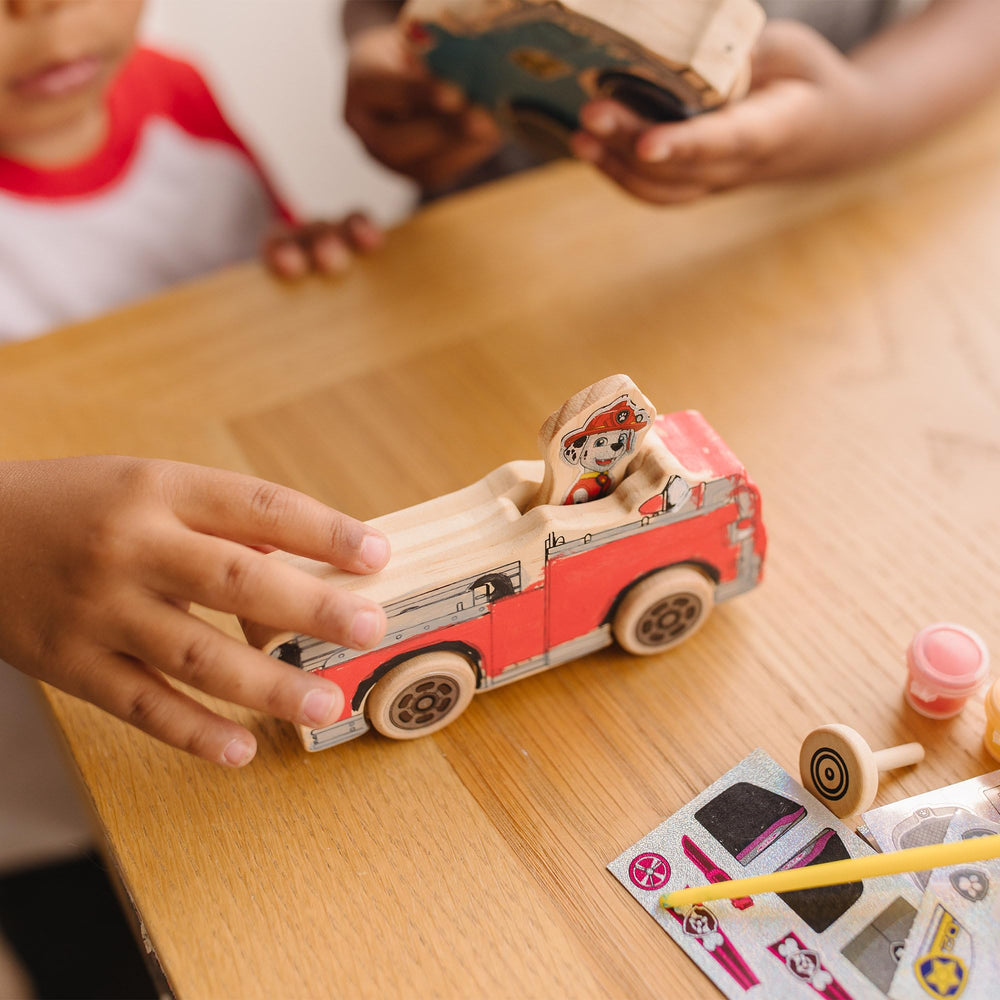 Three foil sticker sheets add shiny details to pups and vehicles.