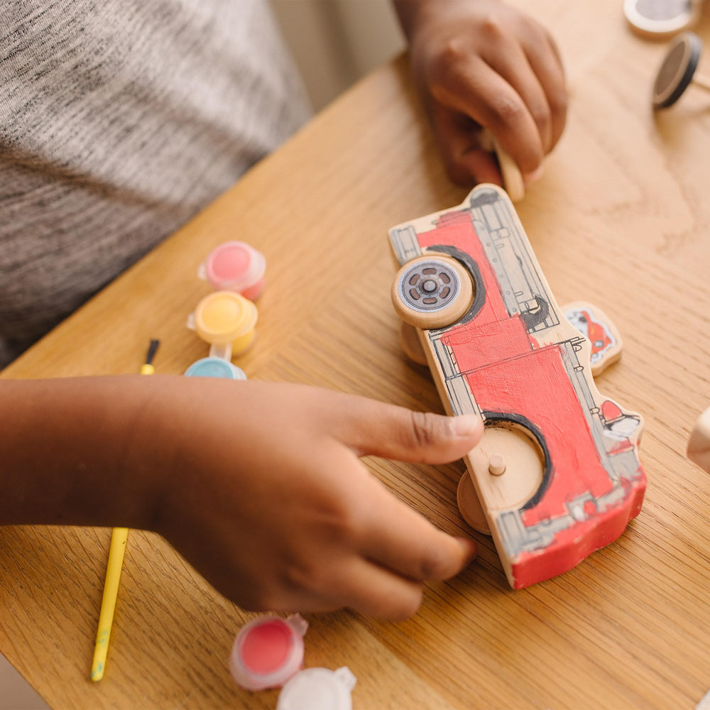 Eight paint pots offer vibrant colors for durable kid-friendly decorating.