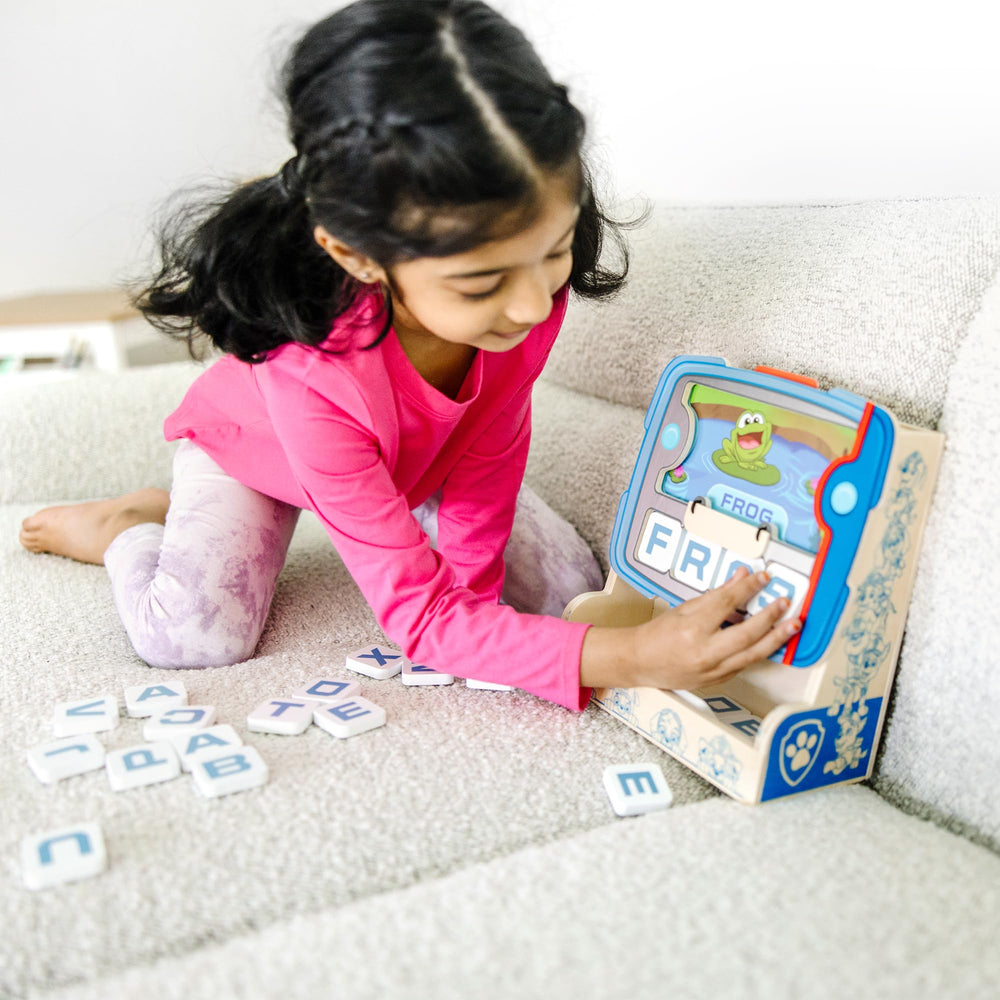 Paw Patrol tiles closeup showing durable letters for hands-on practice.