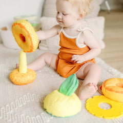 Melissa & Doug Pineapple Soft Stacker textured plastic ring close-up.