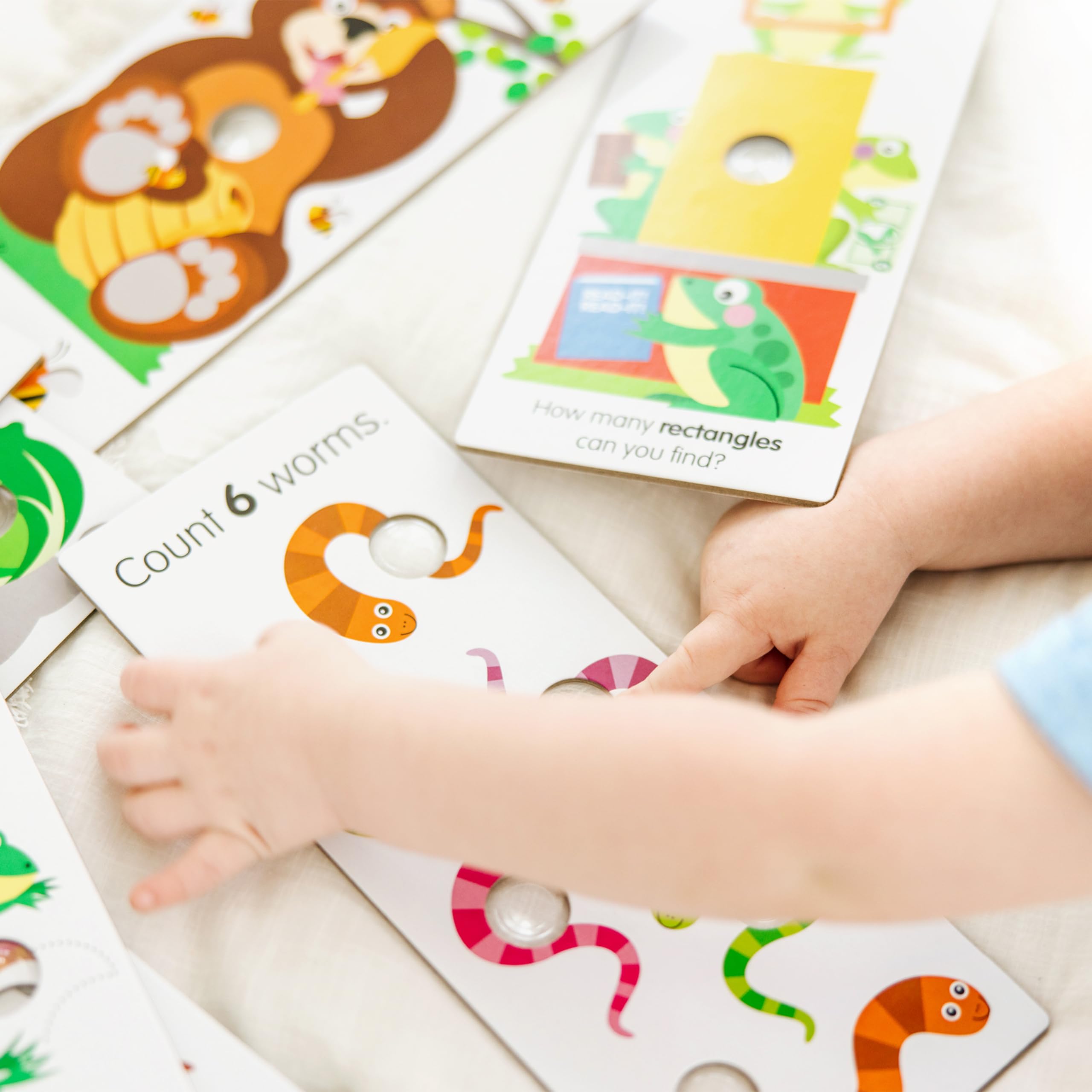 Melissa & Doug Poke-a-Dot Shapes card helps shape naming with tactile exploration