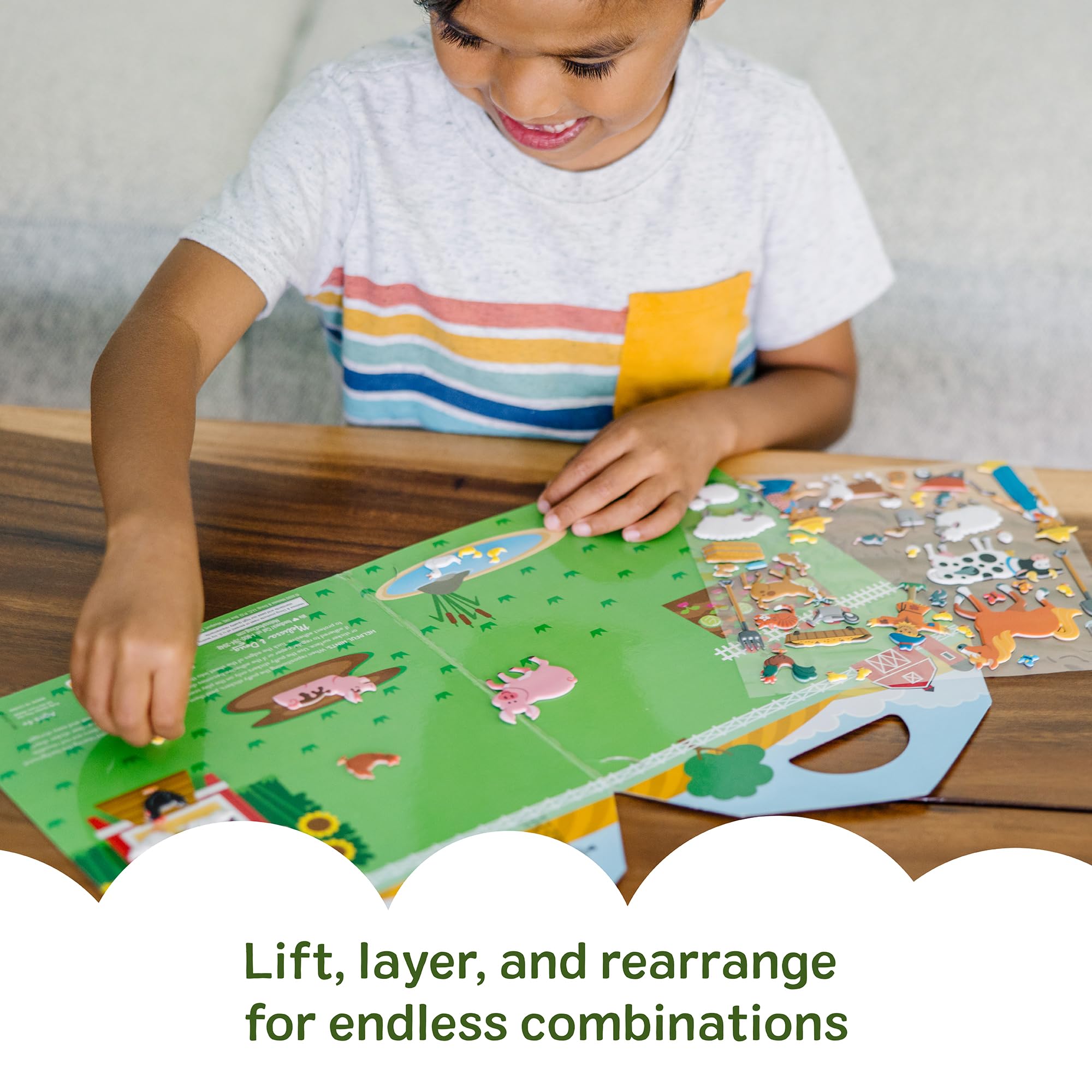 Melissa & Doug double-sided barn background invites layer-and-switch play.