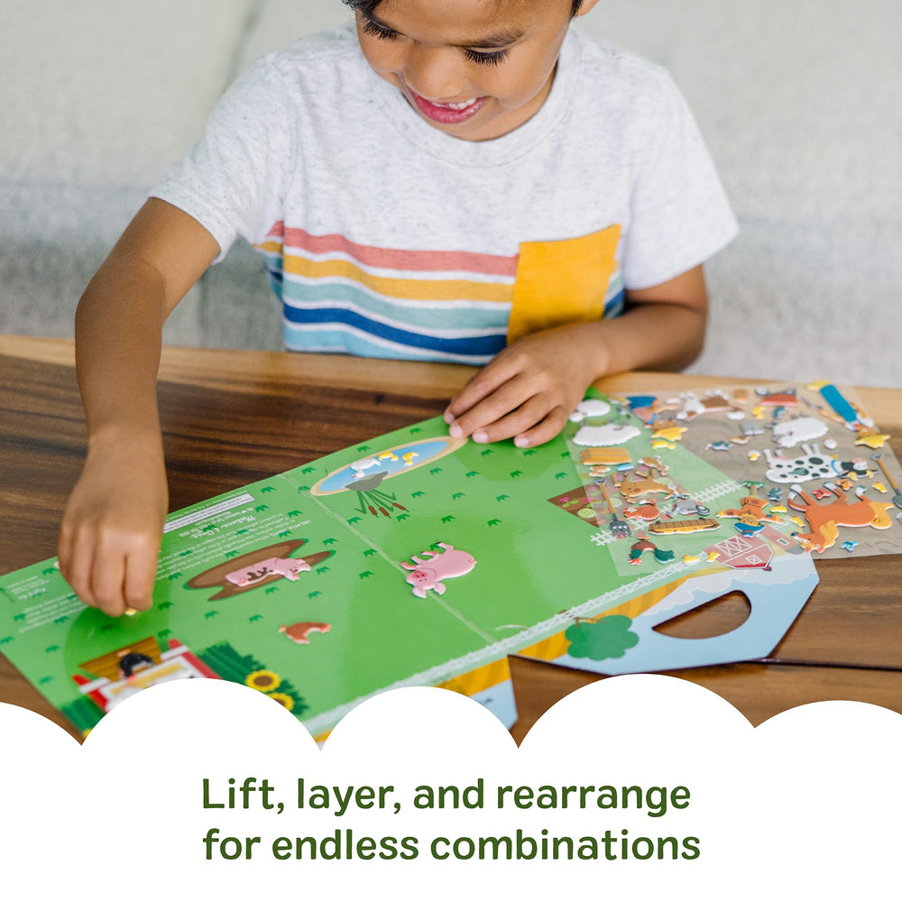 Melissa & Doug double-sided barn background invites layer-and-switch play.