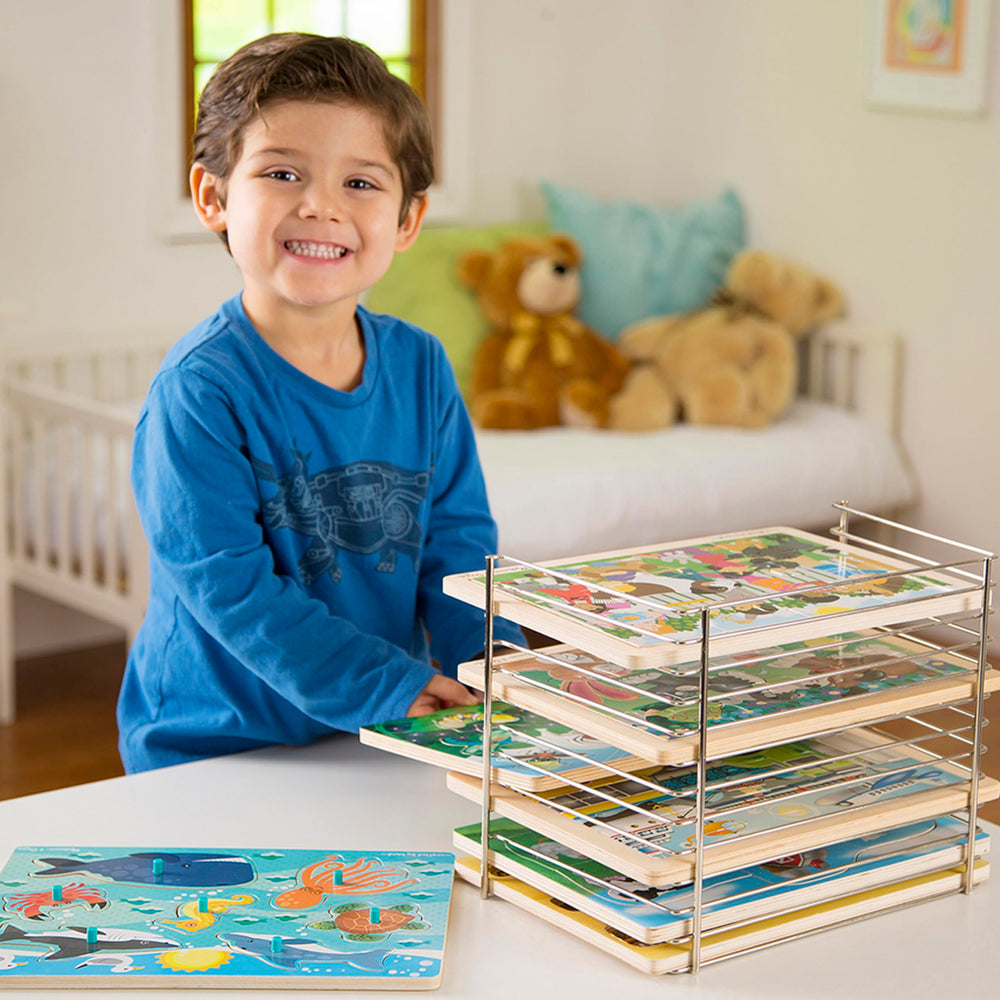 Melissa & Doug puzzle storage rack front view for easy puzzle access