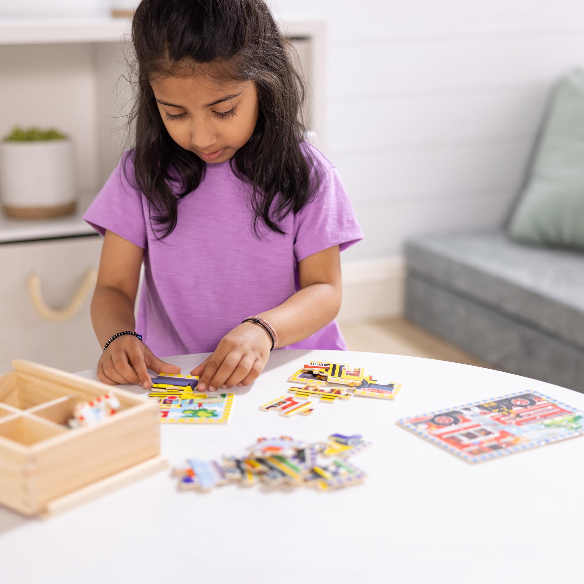 Melissa & Doug race car puzzle with bright artwork inspires imaginative play.
