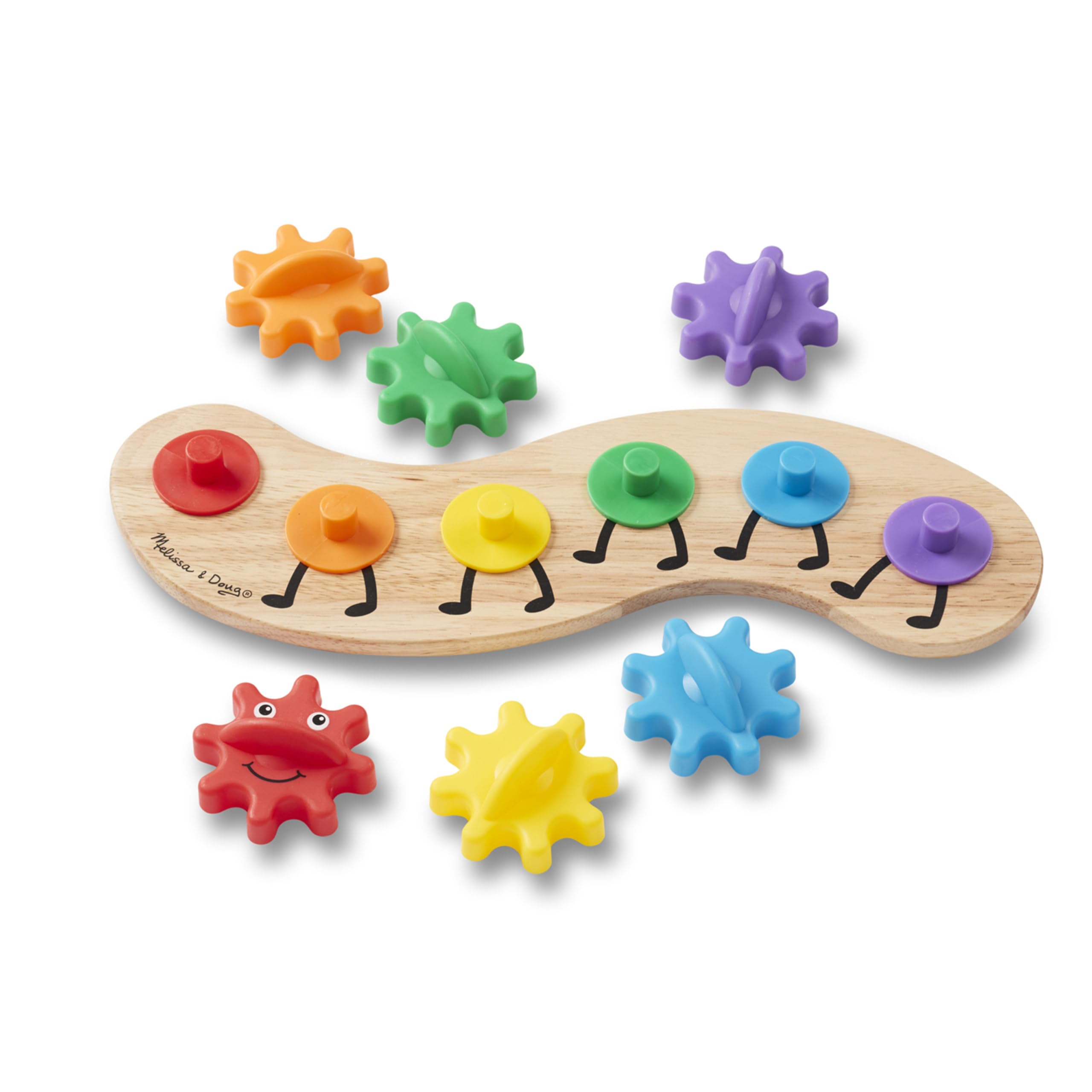Six bright Rainbow Caterpillar gears spinning together on a wooden base