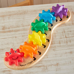Education-focused play with Rainbow Caterpillar gears teaching colors