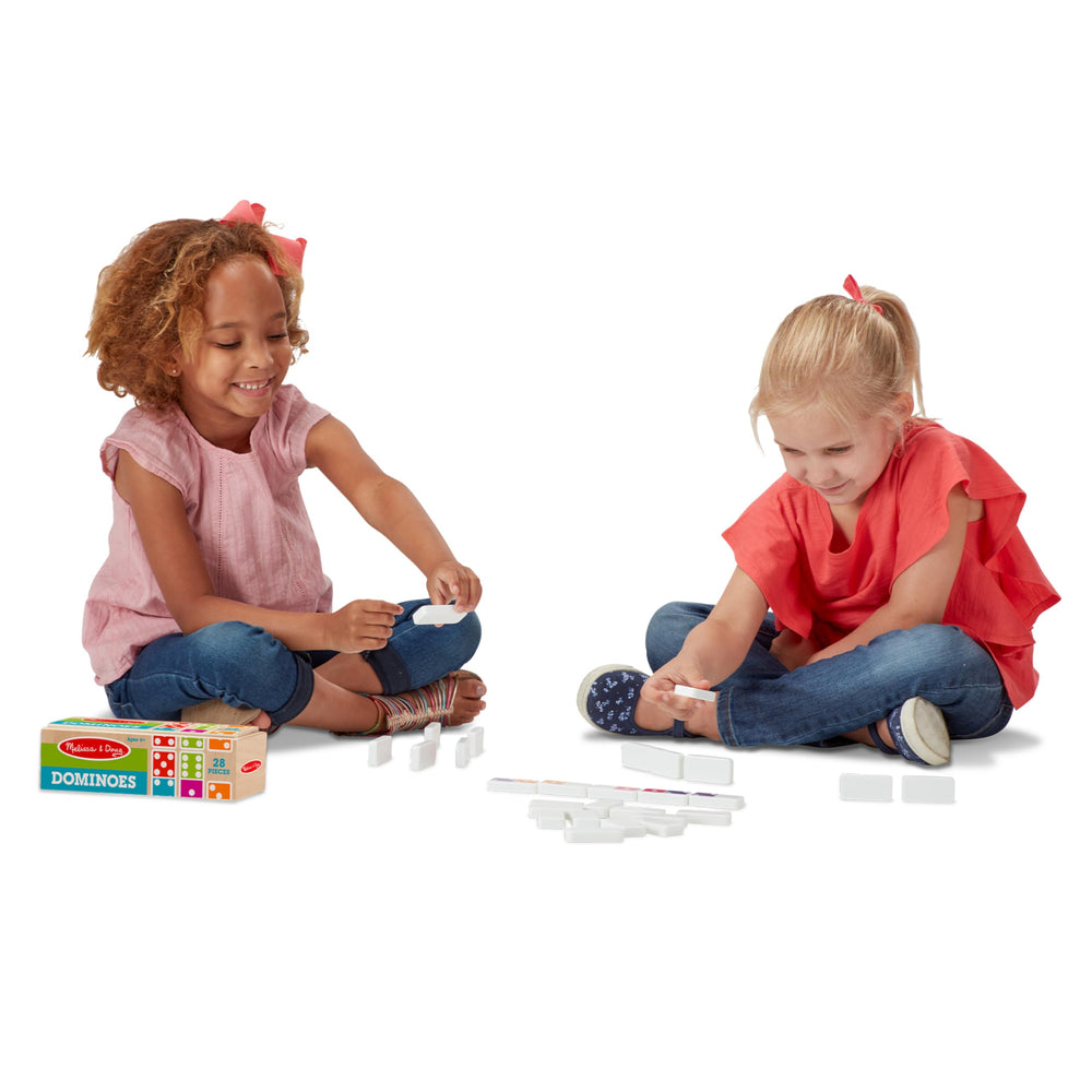 Melissa & Doug rainbow domino tiles on table highlight bright, engaging play