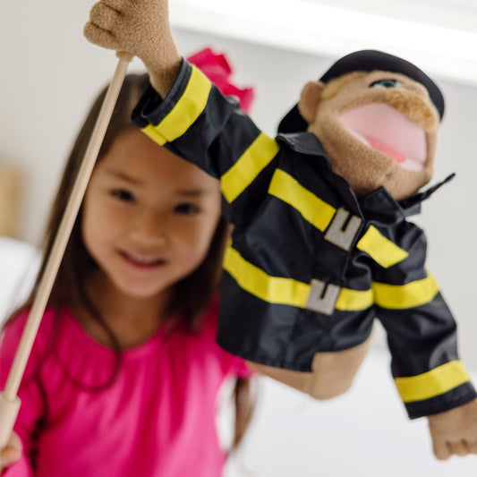 Melissa & Doug Rescue Puppet Set firefighter puppet invites dynamic storytelling and action.