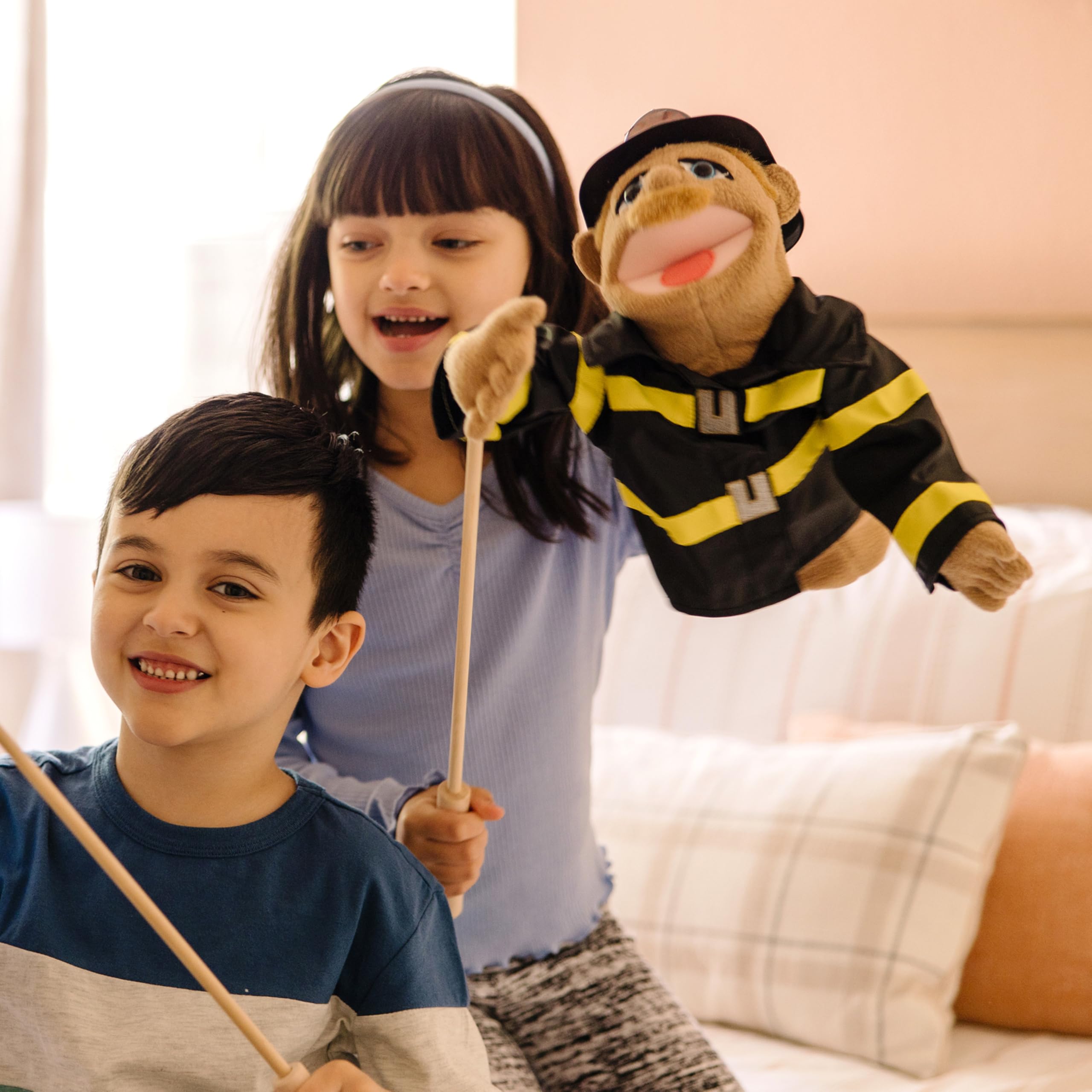 Melissa & Doug Rescue Puppet Set mouth movement enables expressive storytelling.