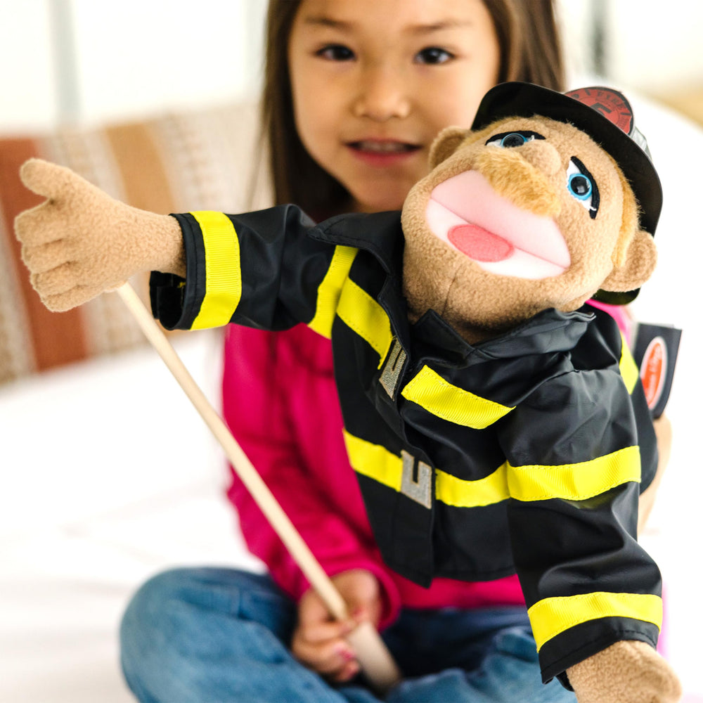 Melissa & Doug Rescue Puppet Set removable clothing encourages mix-and-match role play.