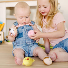 Melissa & Doug Rollables Farm Friends rolling action shows cause and effect.