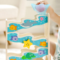Melissa & Doug Rollables Ocean Slide octopus rollable with chime enhances auditory feedback.