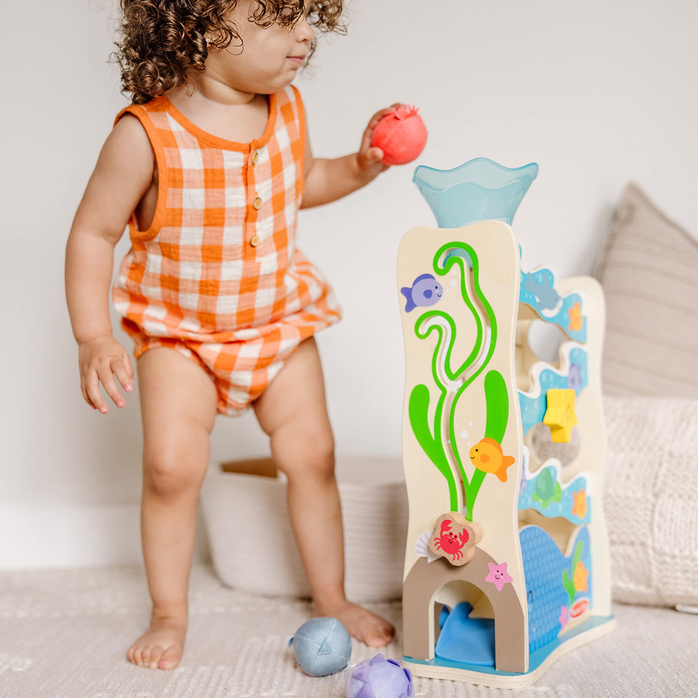 Melissa & Doug Rollables Ocean Slide sea star turns invite curious exploration.