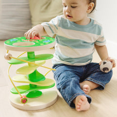 Melissa & Doug Rollables raccoon with chimes enhances tactile exploration.
