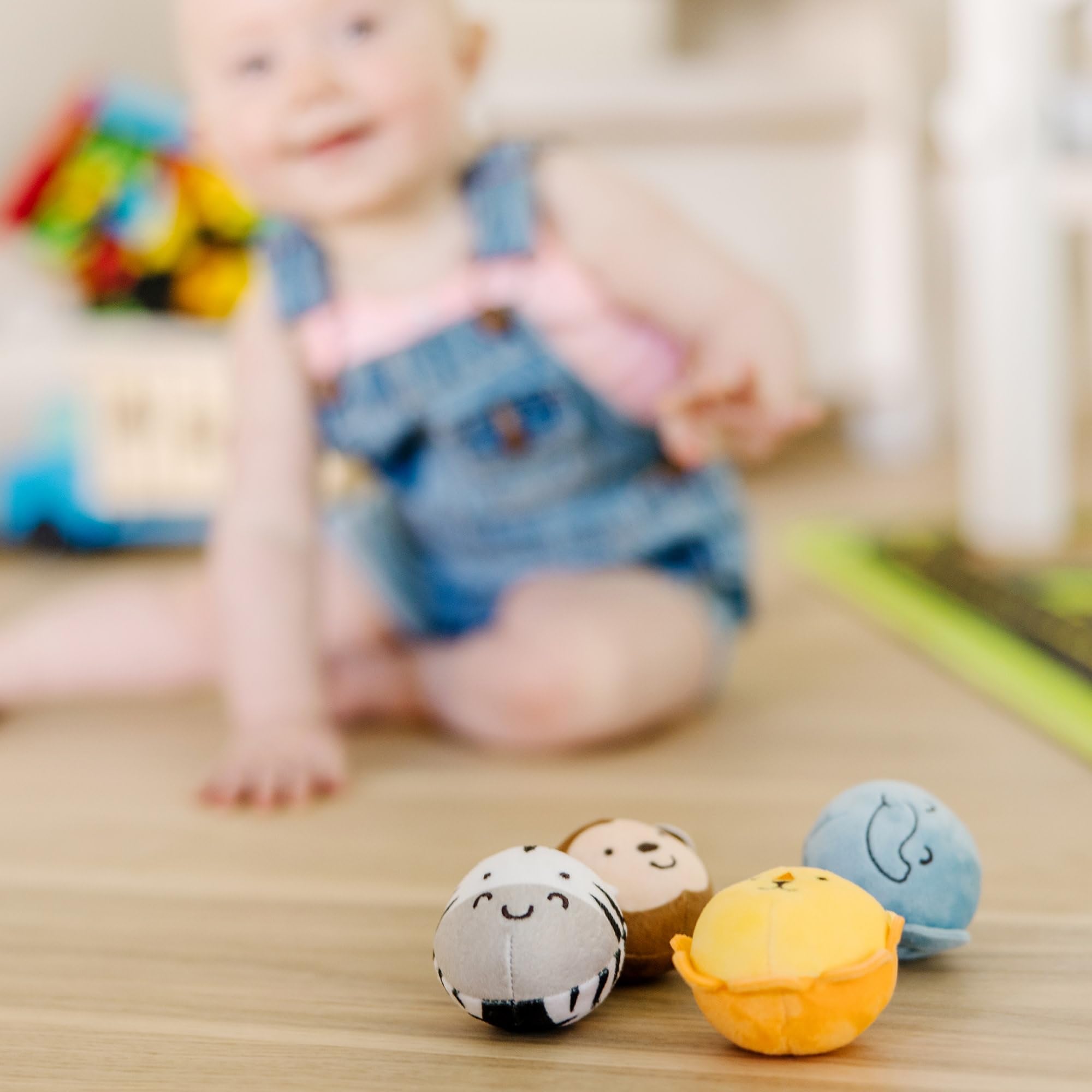 Demo of Melissa & Doug Rollables in play; kids roll to learn cause-and-effect.