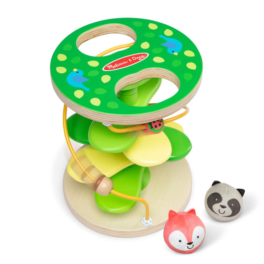 Melissa & Doug Rollables Treehouse Twirl tower promotes imaginative play.